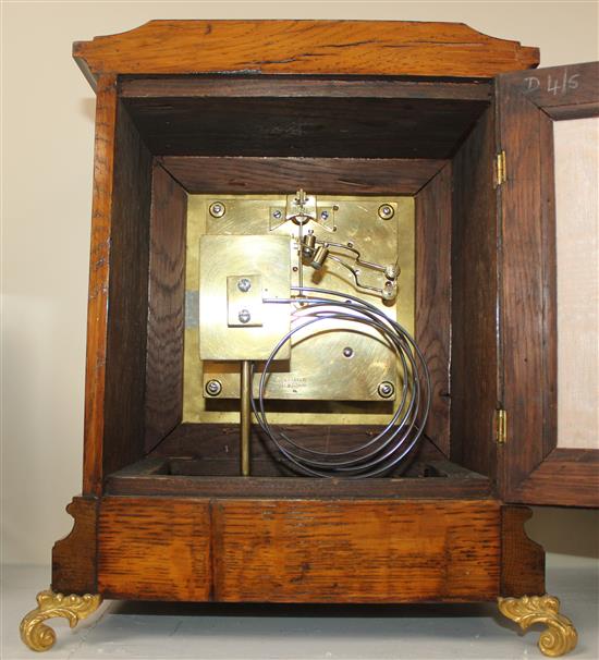 A late Victorian golden oak bracket clock, 13in.